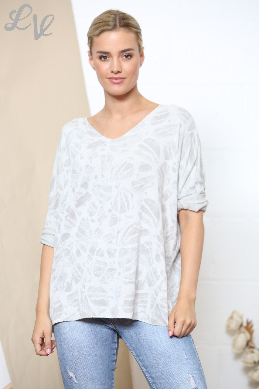 Dames fijntricot trui met abstracte print Wit