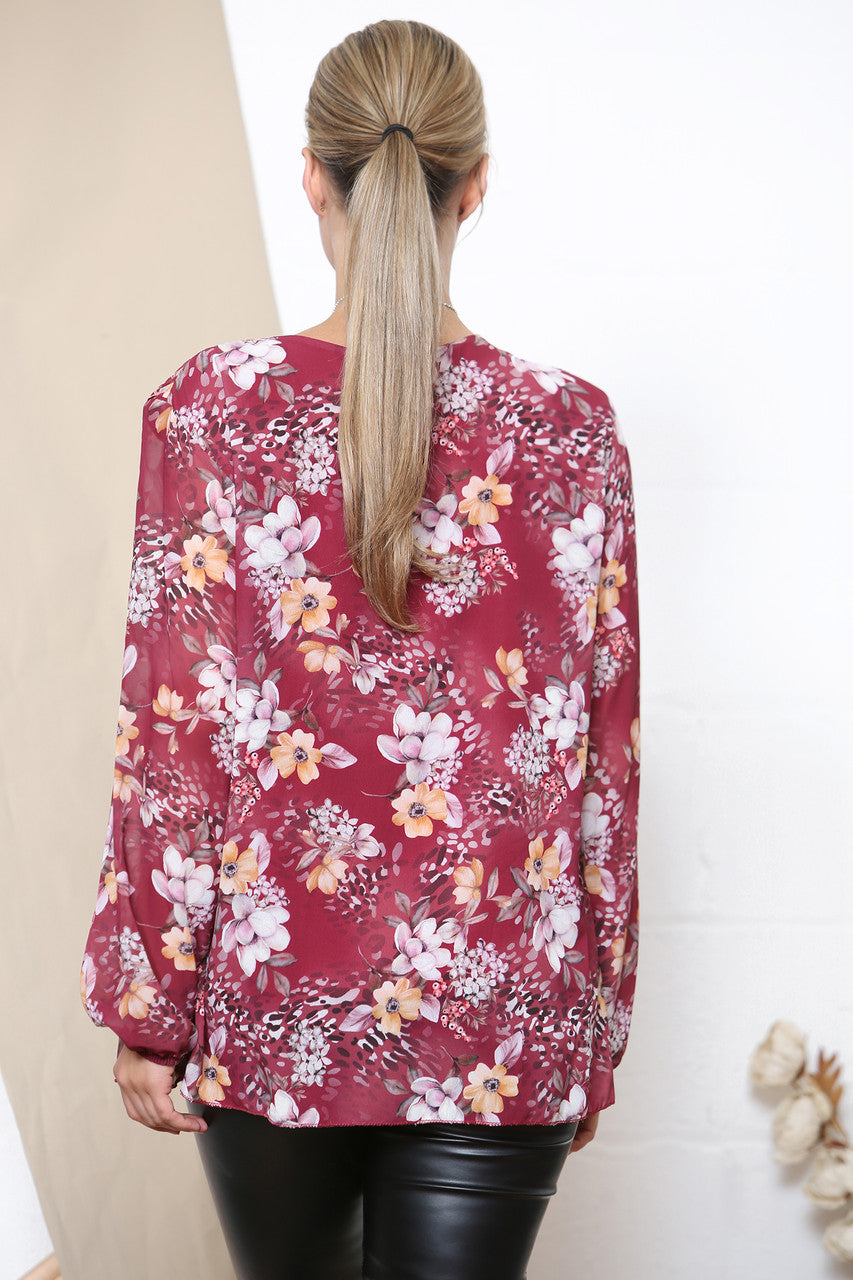 Dames plissérok met lange mouwen en bloemenprint bordeauxrood