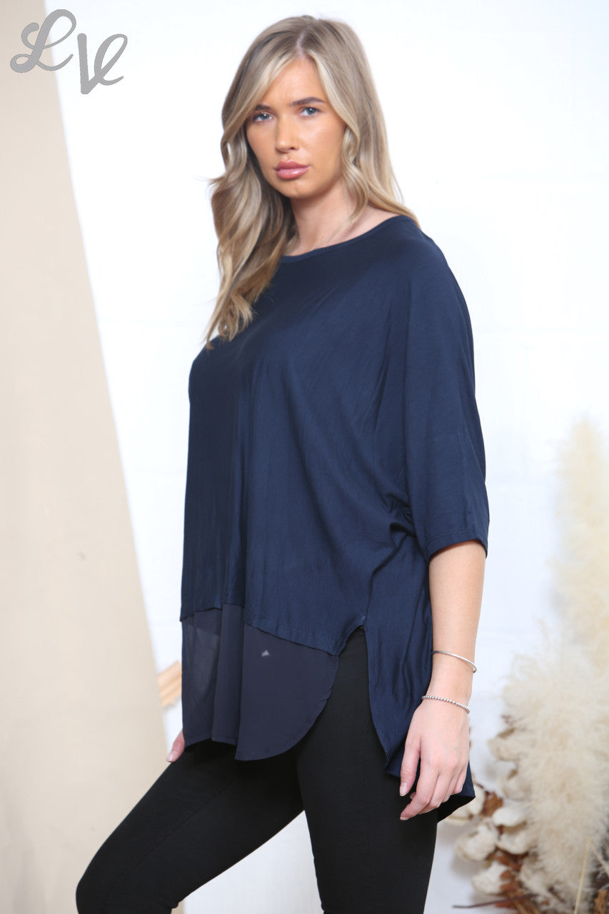 DOORZICHTIGE TOP MET SPLIT IN DE ZOOM NAVY