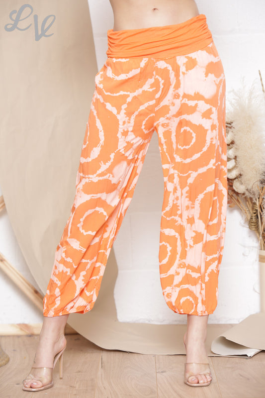 Dames tie-dye broek met swirlprint in gipsy stijl oranje