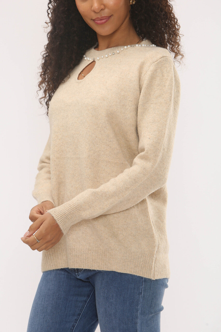TRUI MET PARELS BIJ DE HALS - BEIGE