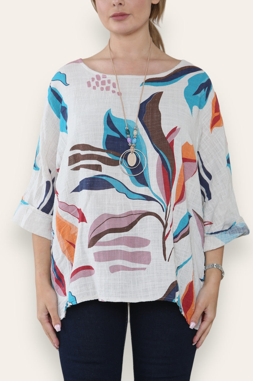 TOP MET ABSTRACTE BLADERENPRINT EN STRASS-STEENTJES