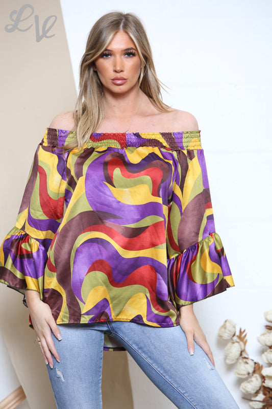 Dames blouse met elastische halslijn en gekleurde wervelprint paars