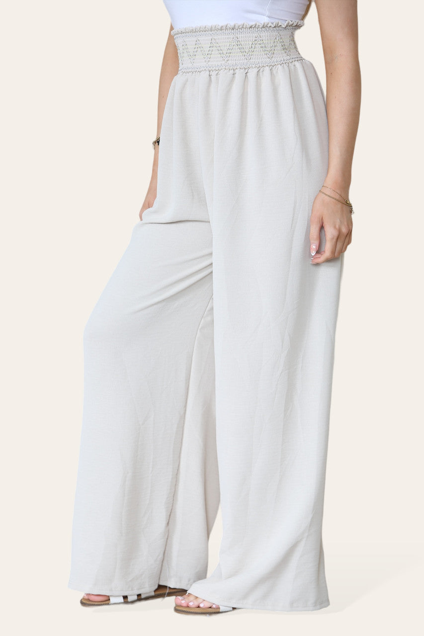 BROEK MET ZIGZAGDETAILS, DIKKE ELASTIEKE TAILLEBAND EN STEENKLEUR
