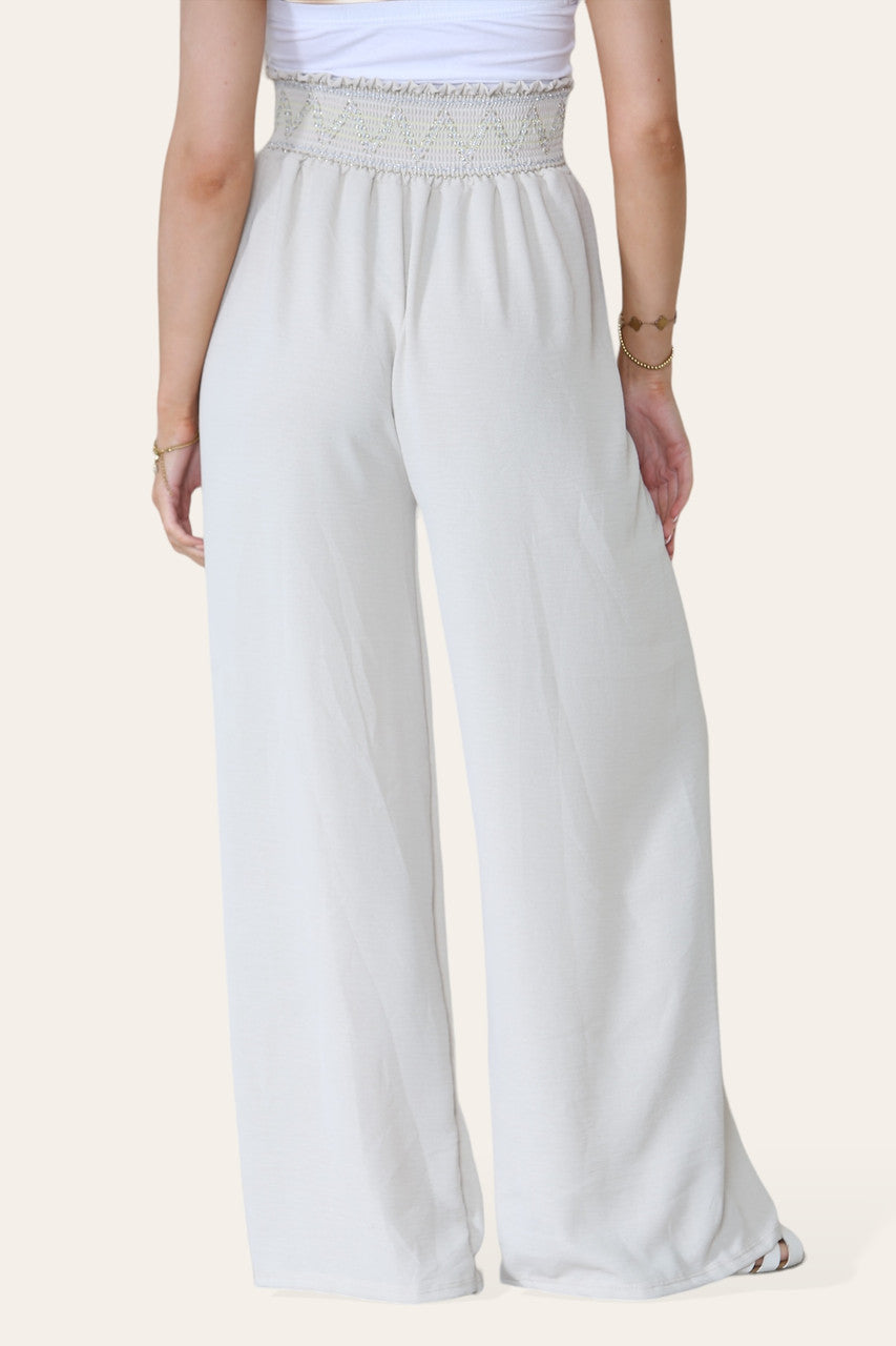 BROEK MET ZIGZAGDETAILS, DIKKE ELASTIEKE TAILLEBAND EN STEENKLEUR