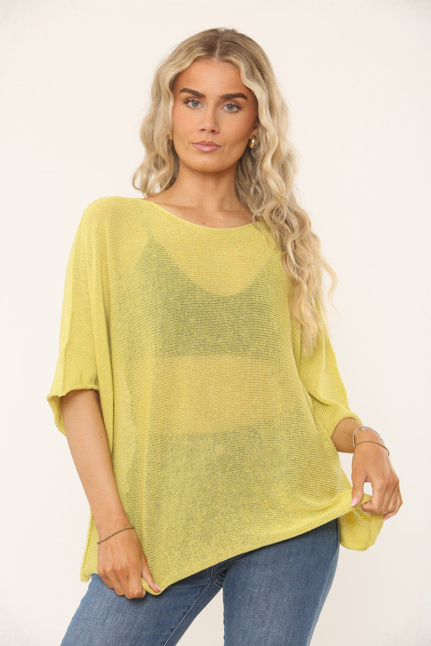 OVERSIDED GEBREIDE TOP MET VLEERMUISMOUWEN - MOSTERD