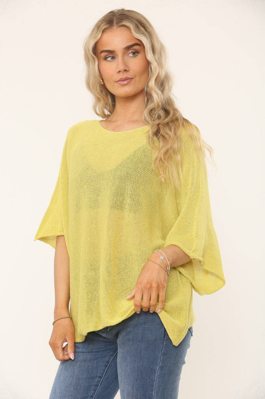 OVERSIDED GEBREIDE TOP MET VLEERMUISMOUWEN - MOSTERD