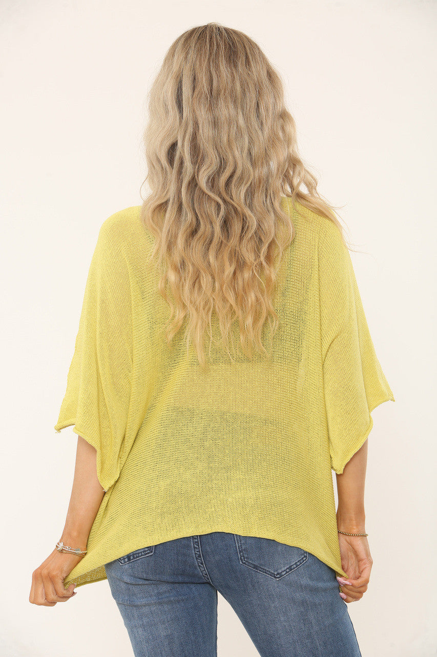 OVERSIDED GEBREIDE TOP MET VLEERMUISMOUWEN - MOSTERD