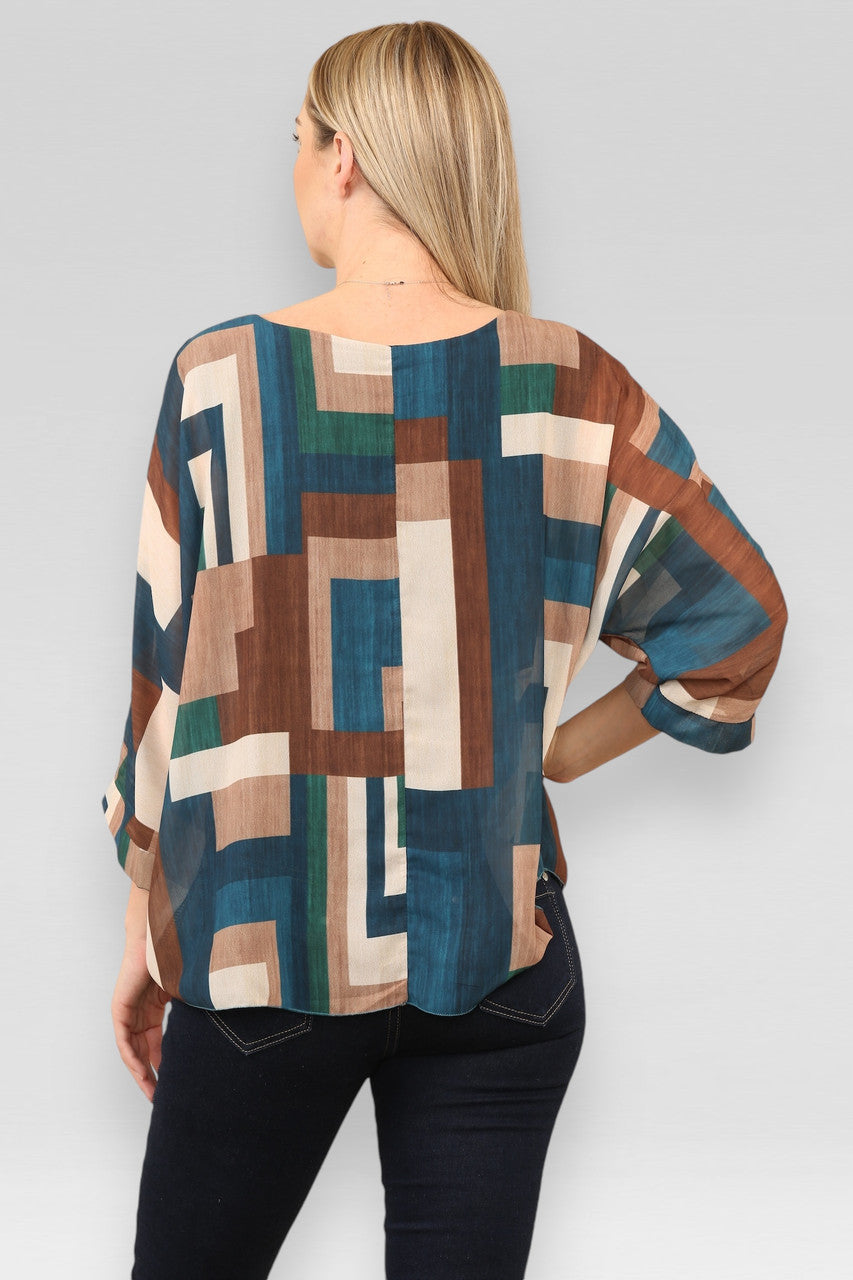 BLOUSE MET VIERKANTEN EN ABSTRACTE PRINT TURKOOIS
