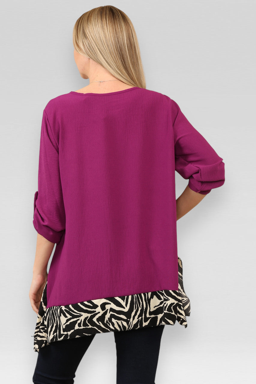 TOP MET ZEBRA PRINT EN ZOOM PAARS