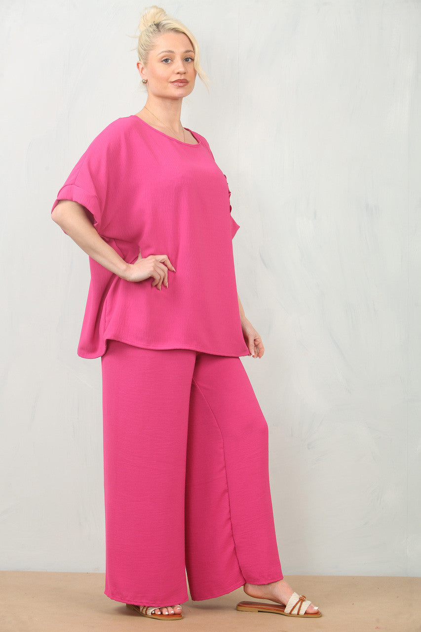 LUCHTIGE BLOEMEN CORSAGE TOP & BROEK SET - CERISE