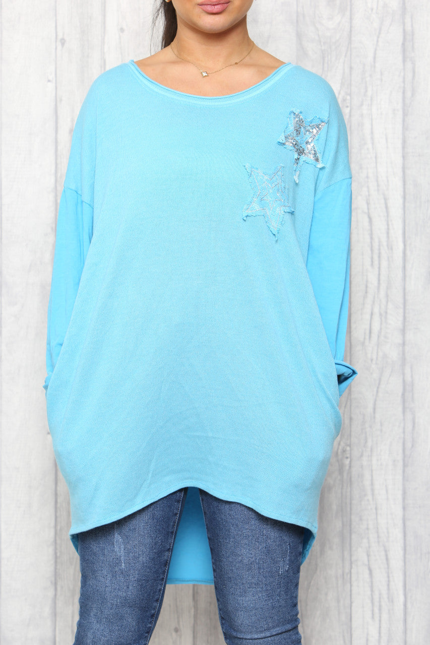 Dames distressed tuniektop met lovertjessterren turkoois