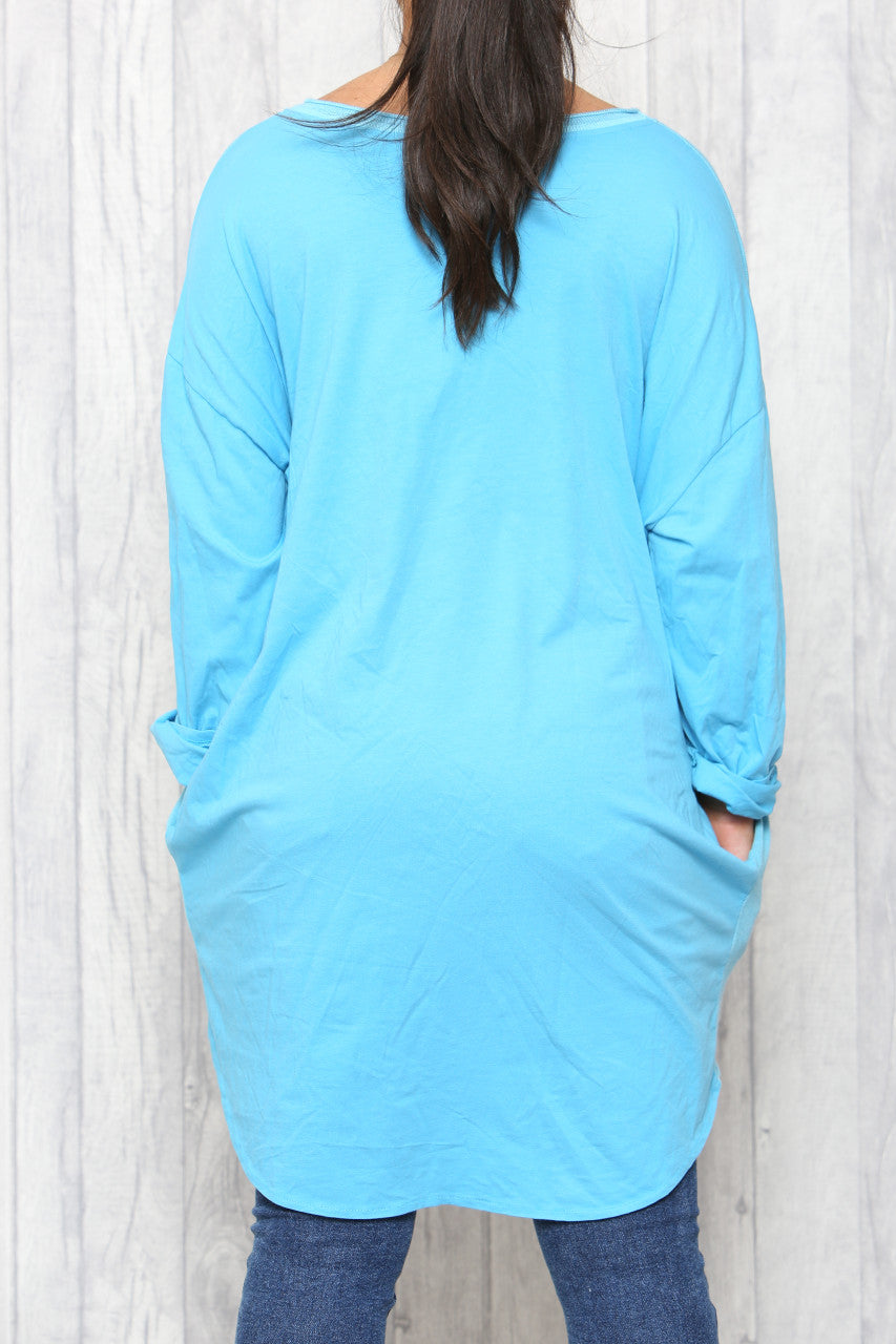 Dames distressed tuniektop met lovertjessterren turkoois