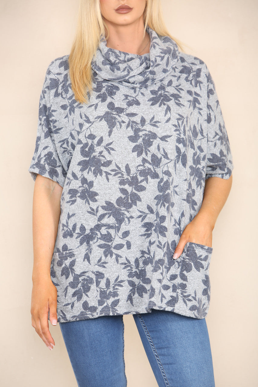 COL TRUI MET BLOEMENPRINT EN ZAKKEN BLAUW