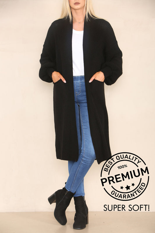 GROFGEBREID VEST MET BALLONMOUWEN LANG MODEL ZWART