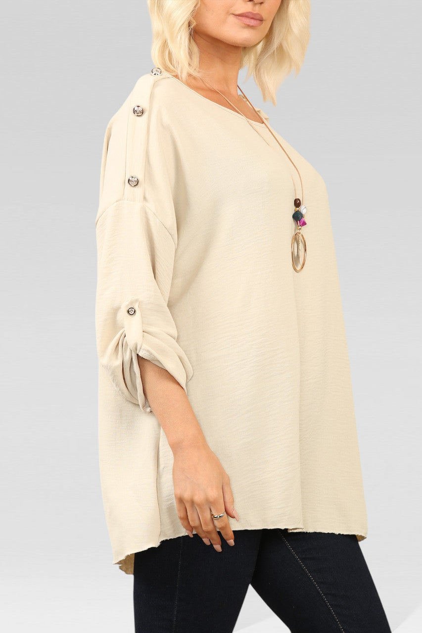 BLOUSE MET KNOPEN OP DE MOUWEN EN HALSSTEEN KETTING