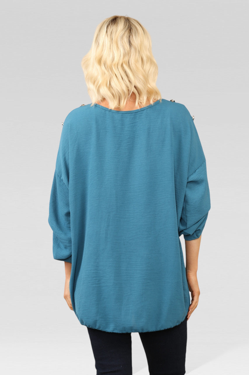 BLOUSE MET KNOPEN OP MOUW EN HALSBAND TEAL