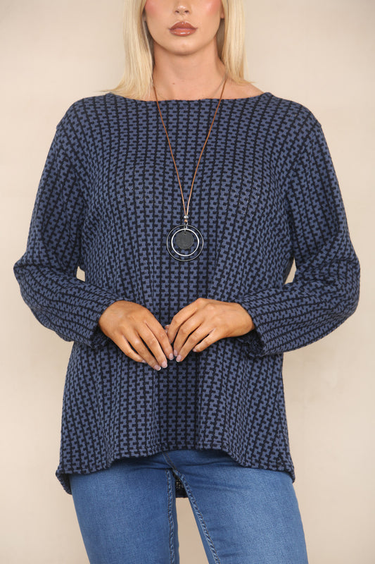 VERTICAAL GEBREID PATROON MET GARENTRUI EN DENIM