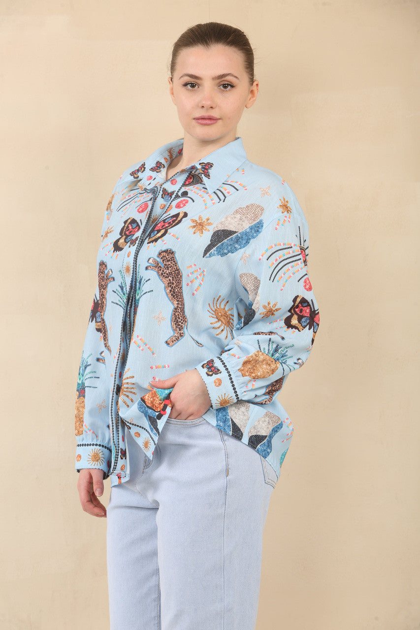 BLOUSE MET TROPISCHE PRINT EN WIJDE MOUWEN - LICHTBLAUW