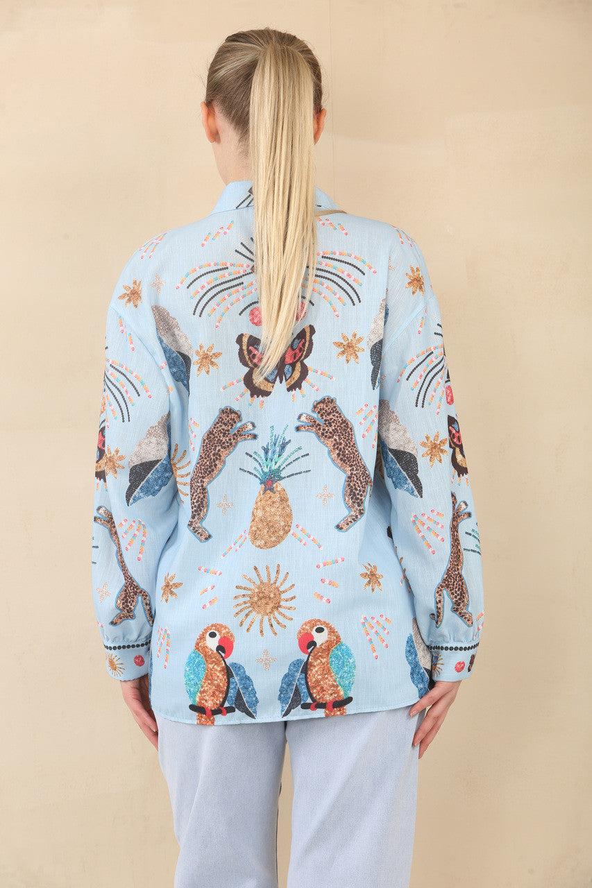 BLOUSE MET TROPISCHE PRINT EN WIJDE MOUWEN - LICHTBLAUW