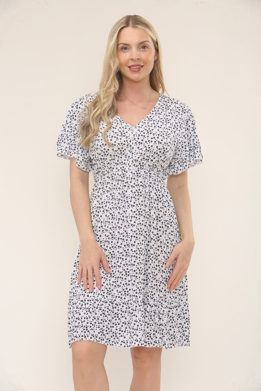 JURK MET KLEINE BLOEMPRINT EN KNOPENSLUITING – WIT