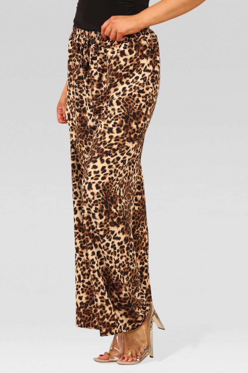 BROEKEN MET BREDE PIJPEN, ELASTIEKE TAILLE EN CHEETAHPRINT