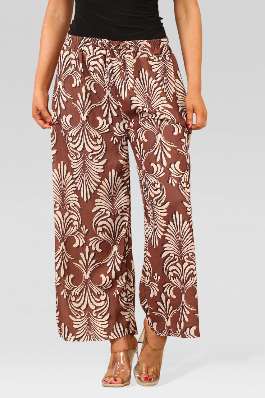 WIJDE PIJP BROEK MET ELASTISCHE TAILLE EN ART DECO PRINT ROEST