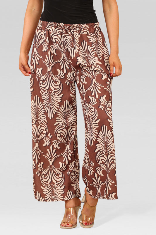 WIJDE PIJP BROEK MET ELASTISCHE TAILLE EN ART DECO PRINT ROEST