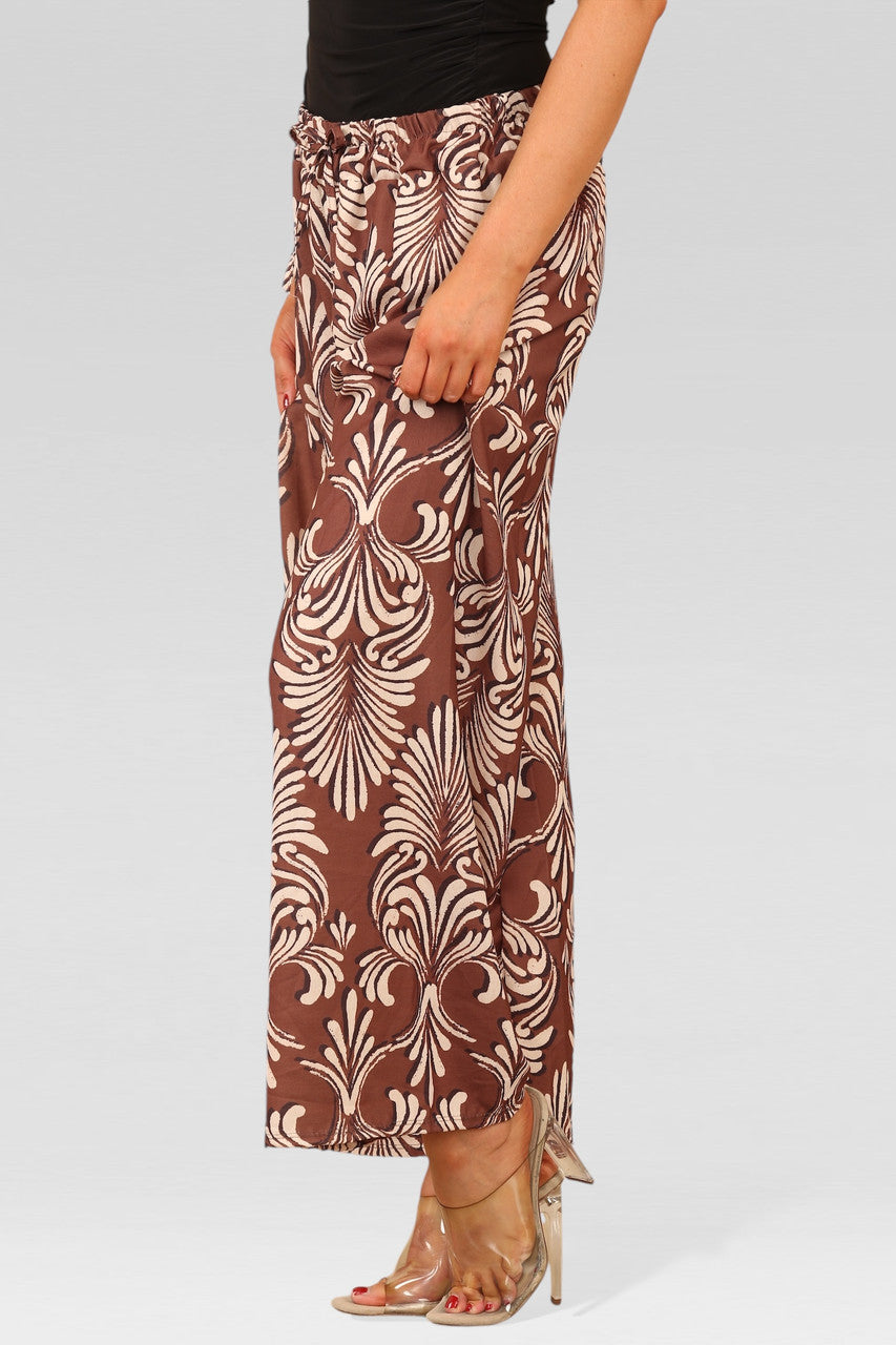WIJDE PIJP BROEK MET ELASTISCHE TAILLE EN ART DECO PRINT ROEST