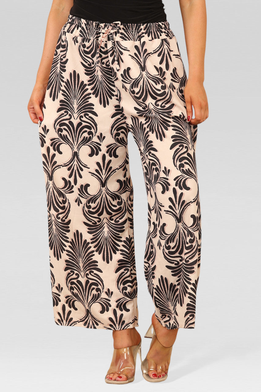 WIJDE BROEK MET ELASTISCHE TAILLE EN ART DECO-PRINT CRÈME