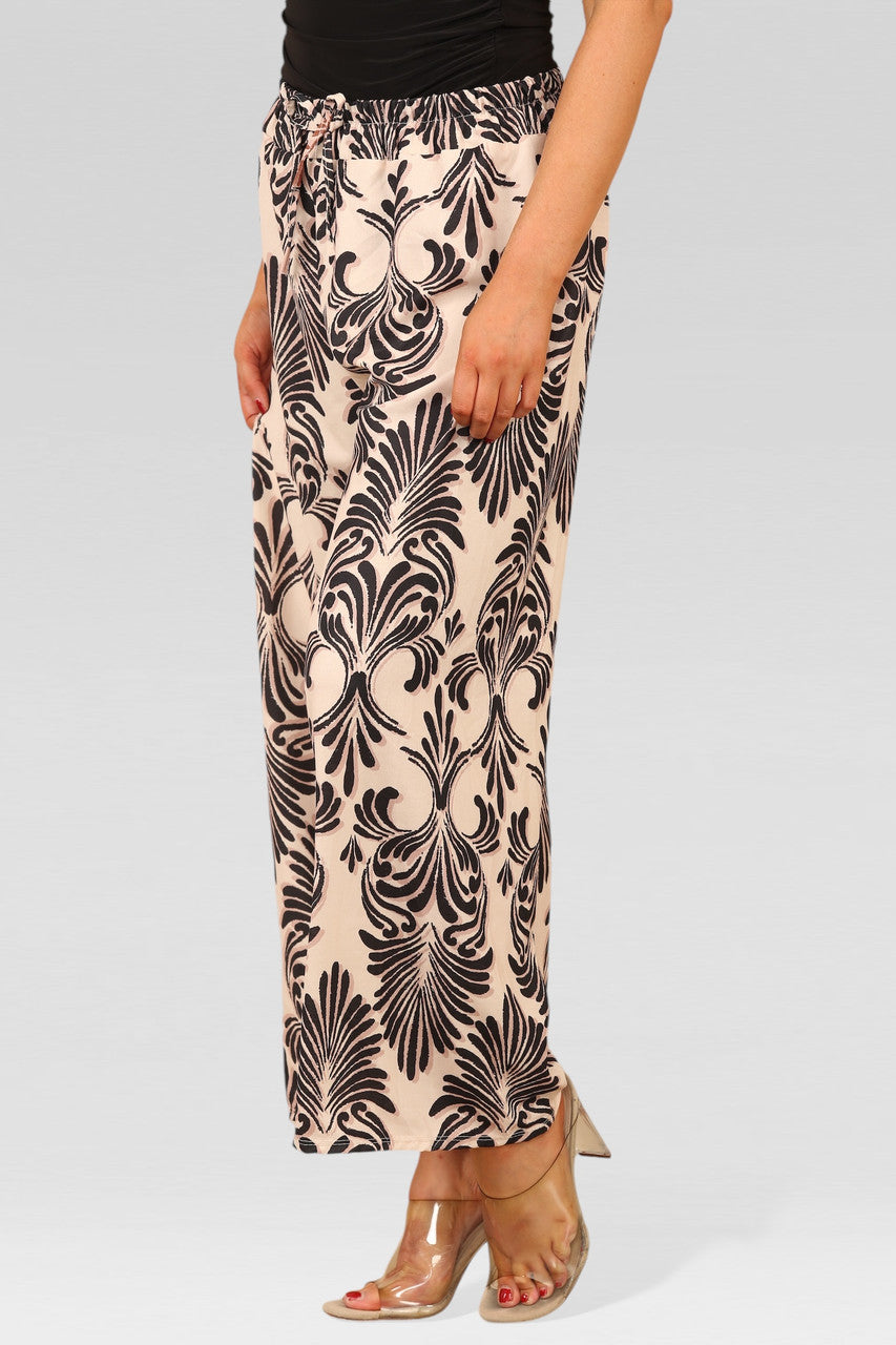 WIJDE BROEK MET ELASTISCHE TAILLE EN ART DECO-PRINT CRÈME