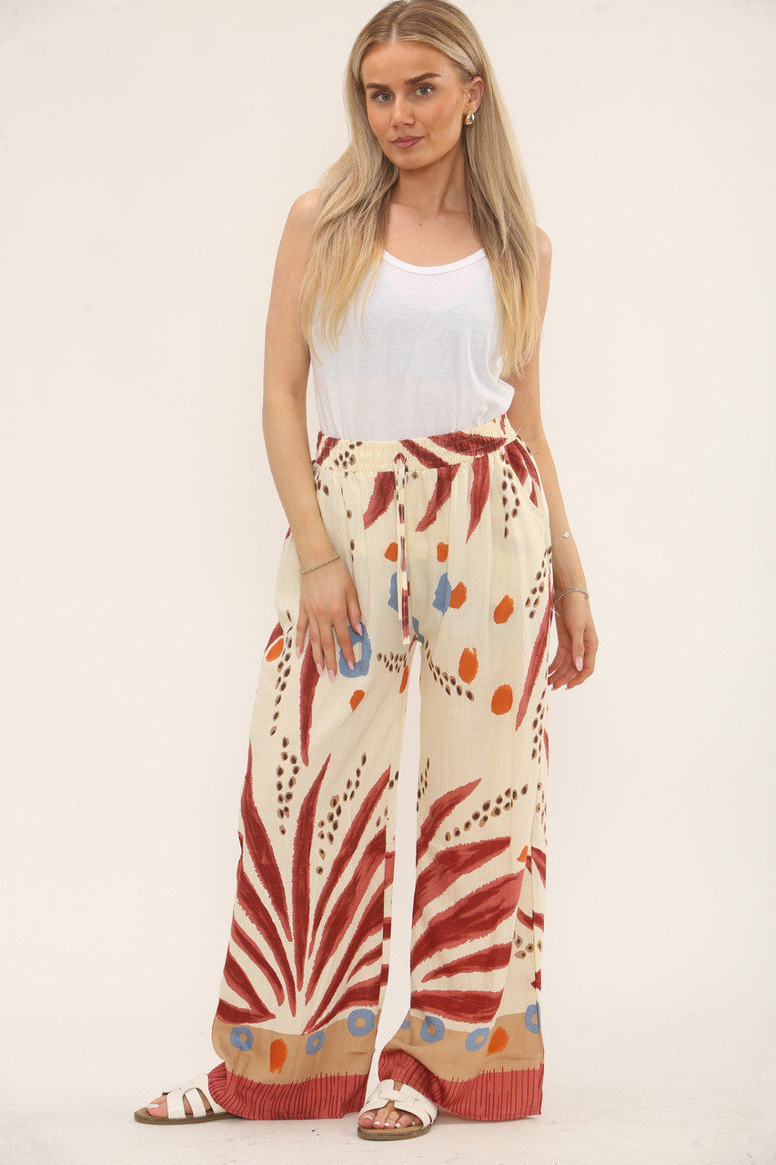 TROPISCHE PRINT BROEK MET ELASTIEK IN DE TAILLE - ROESTBRUIN