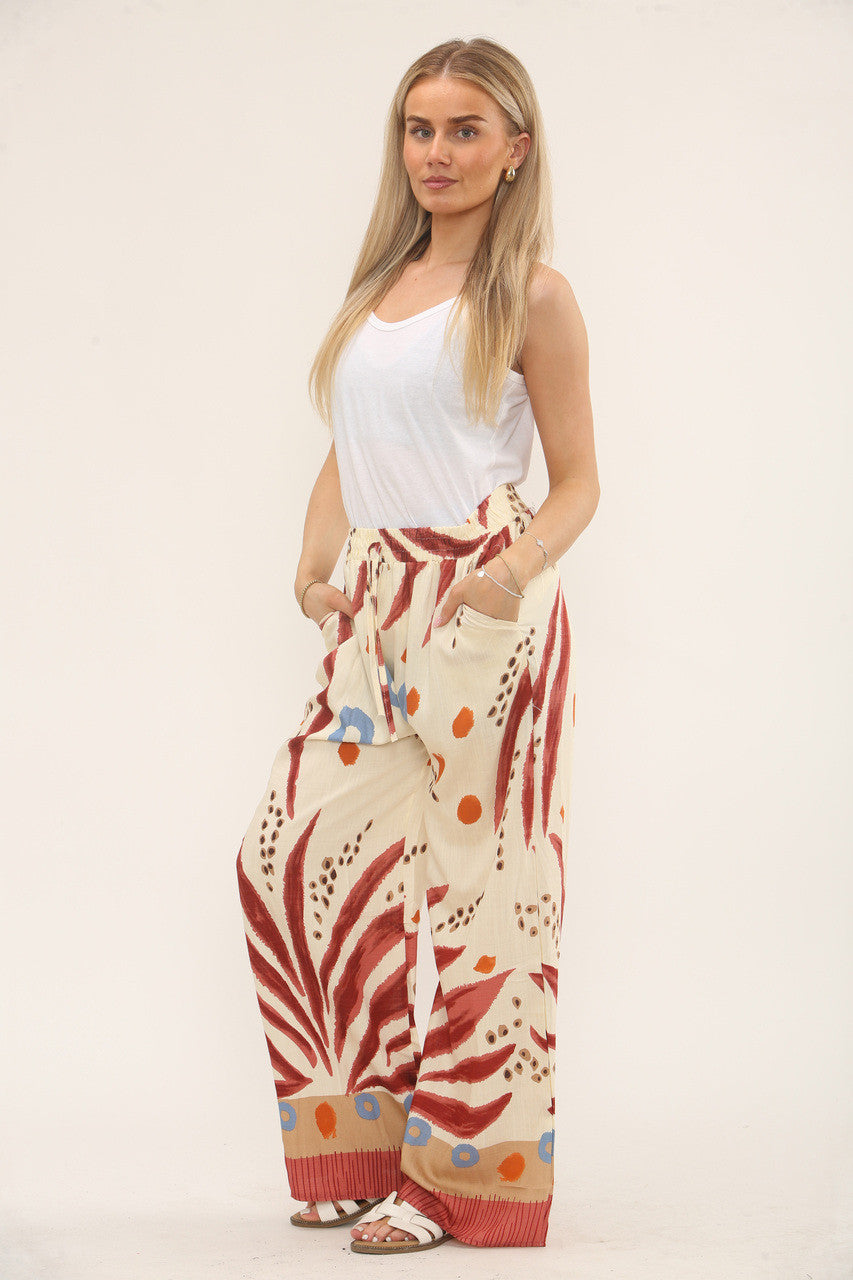 TROPISCHE PRINT BROEK MET ELASTIEK IN DE TAILLE - ROESTBRUIN