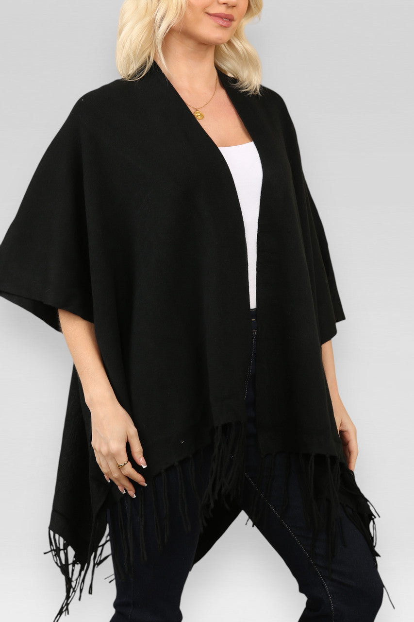GEBREID VEST MET KWARTJES EN CAPE ZWART