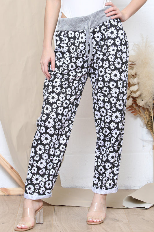 Dames joggingbroek met madeliefjesprint zwart