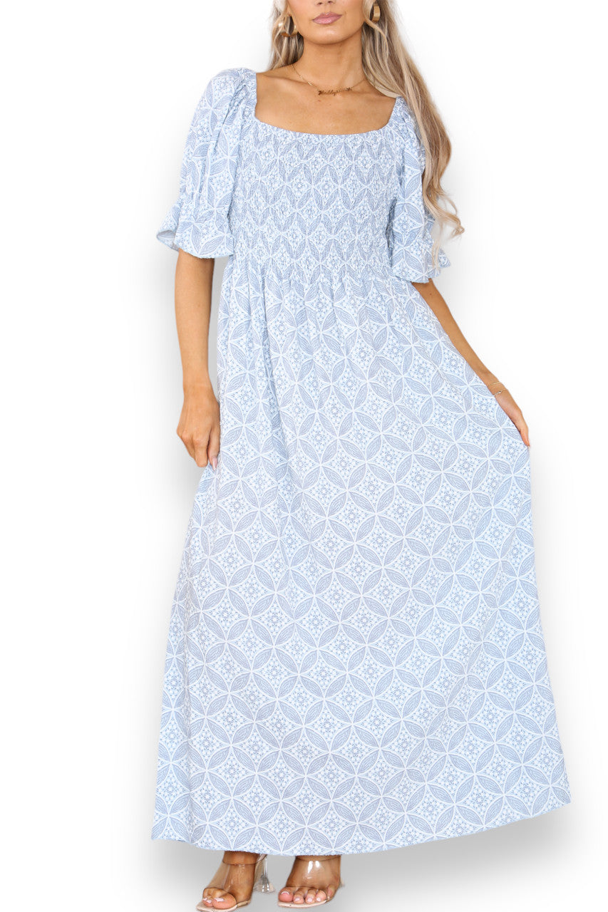 GEOMETRISCHE BARDOT MAXIJURK MET KLEINE BLOEMPRINT LICHTBLAUW