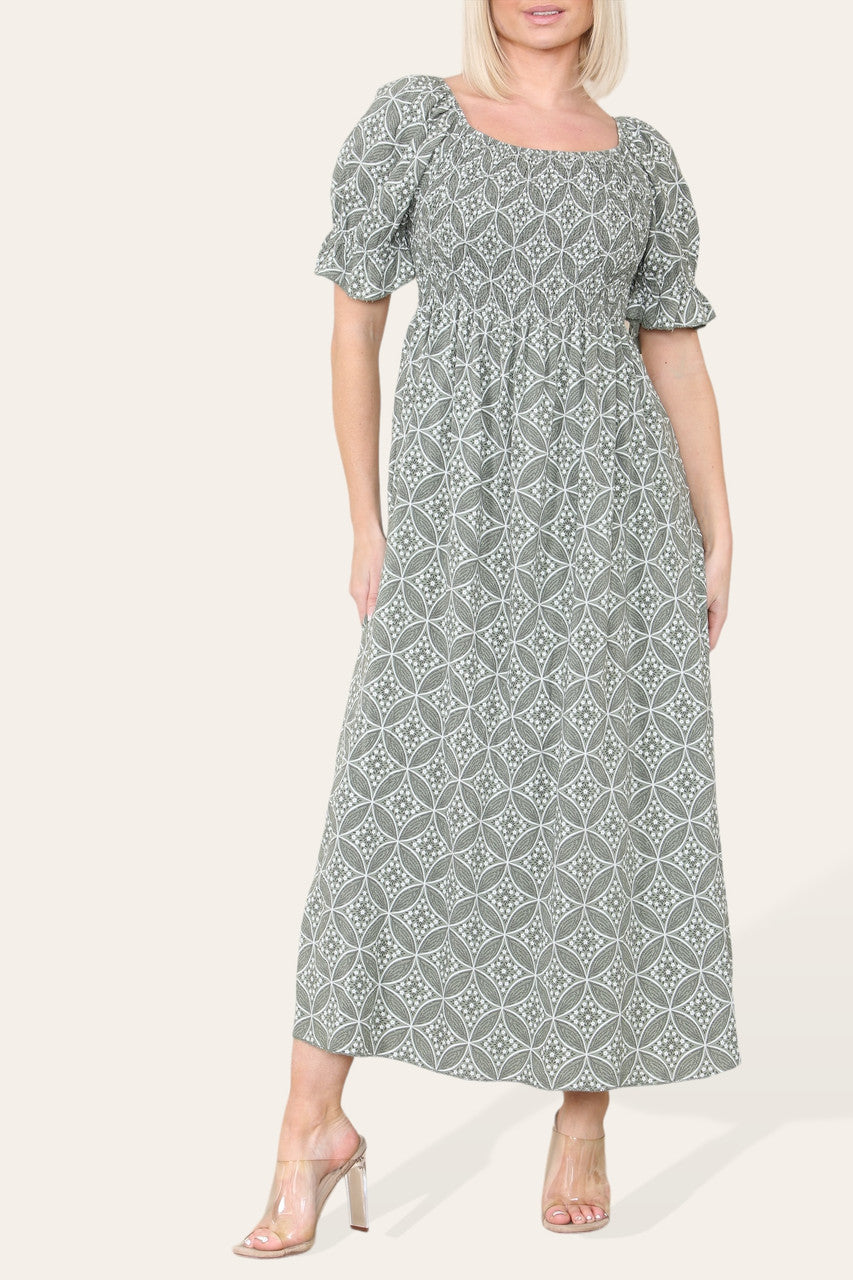 LUCHTIGE GEOMETRISCHE BLOEMEN MAXI JURK MET BARDOT HALSLIJN KHAKI