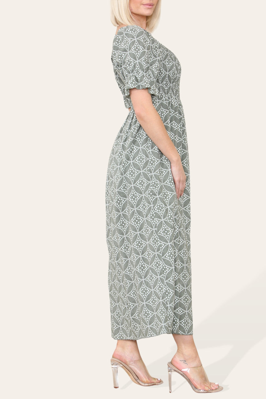 LUCHTIGE GEOMETRISCHE BLOEMEN MAXI JURK MET BARDOT HALSLIJN KHAKI