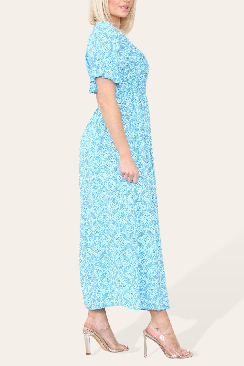 MAXIJURK MET GEOMETRISCHE BLOEMPRINT EN BARDOT-HALS TURKOOIS