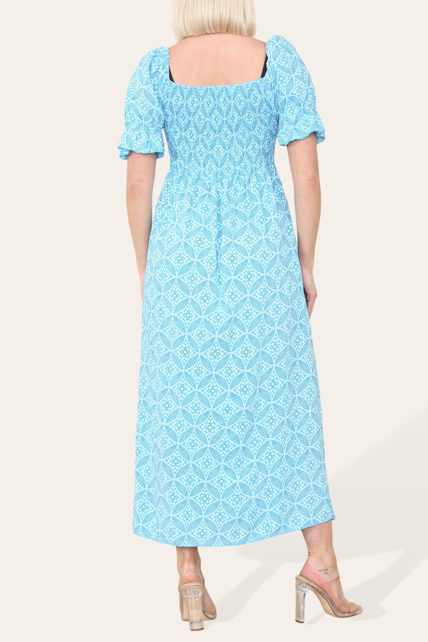 MAXIJURK MET GEOMETRISCHE BLOEMPRINT EN BARDOT-HALS TURKOOIS