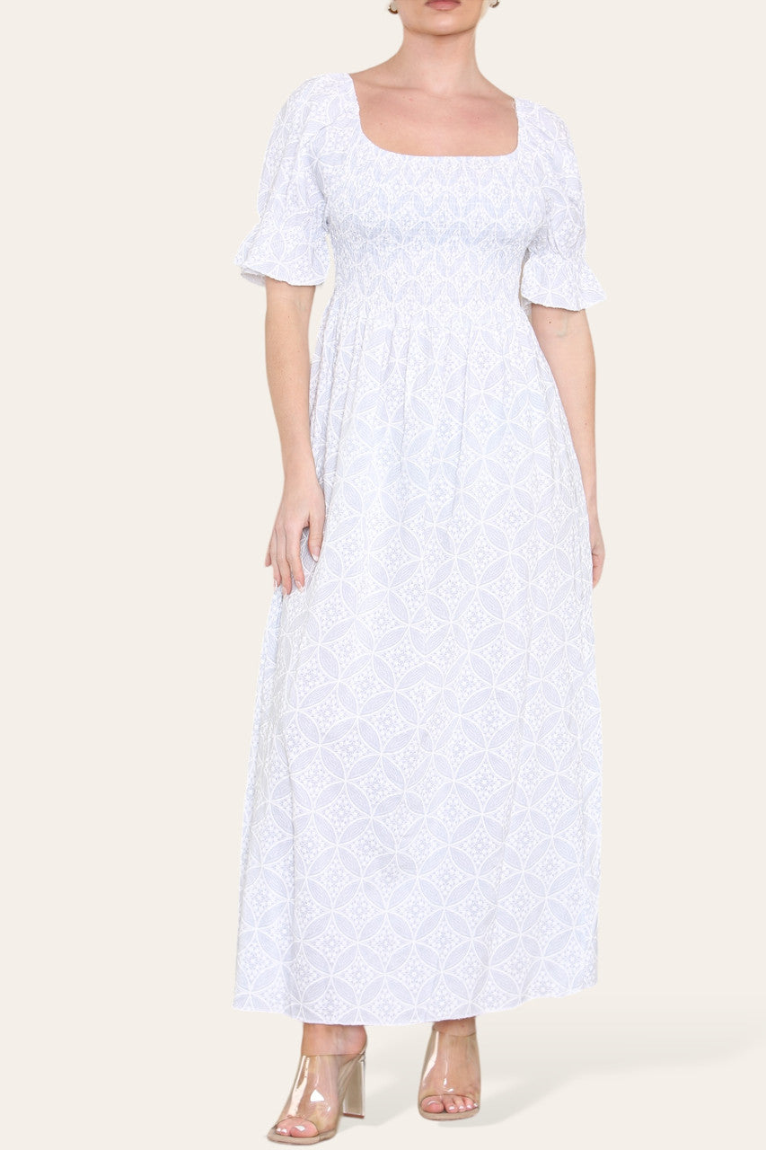 WITTE MAXIJURK MET GEOMETRISCHE BLOEMENPRINT EN BARDOT-HALS