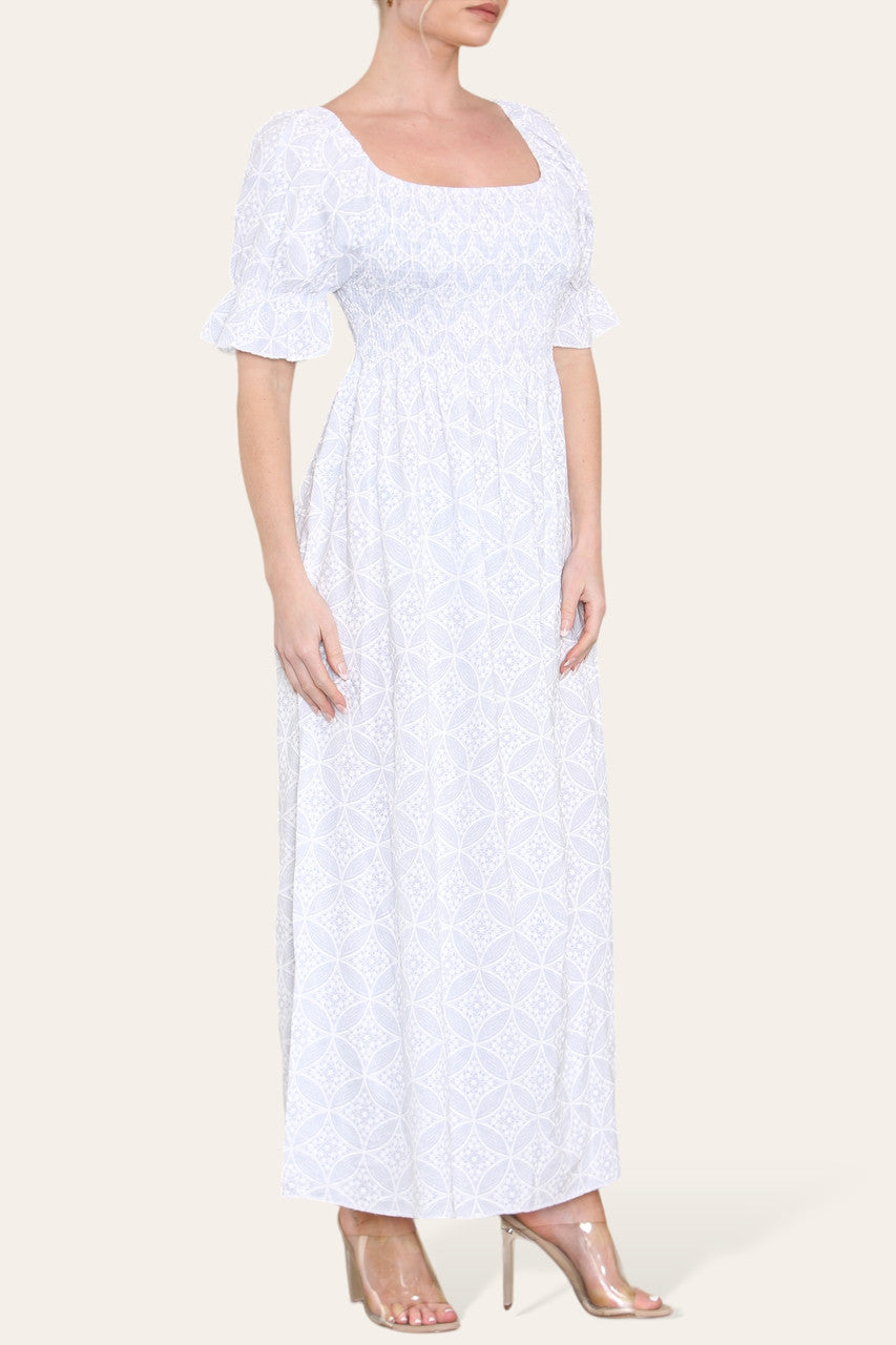 WITTE MAXIJURK MET GEOMETRISCHE BLOEMENPRINT EN BARDOT-HALS