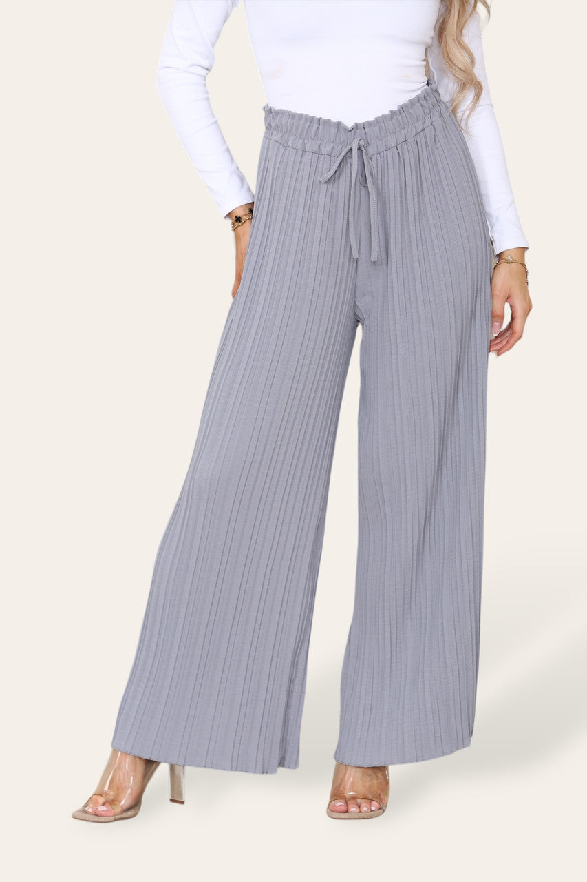 PAPIEREN BROEK MET WIJDE PIJPEN, PLISSÉPLOOIEN EN ELASTIEKE TAILLE ZILVERGRIJS