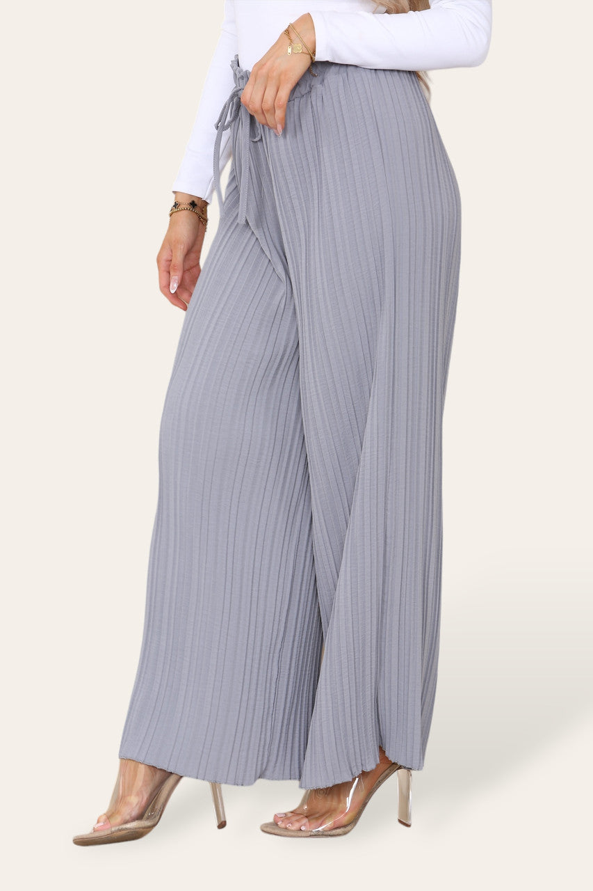 PAPIEREN BROEK MET WIJDE PIJPEN, PLISSÉPLOOIEN EN ELASTIEKE TAILLE ZILVERGRIJS