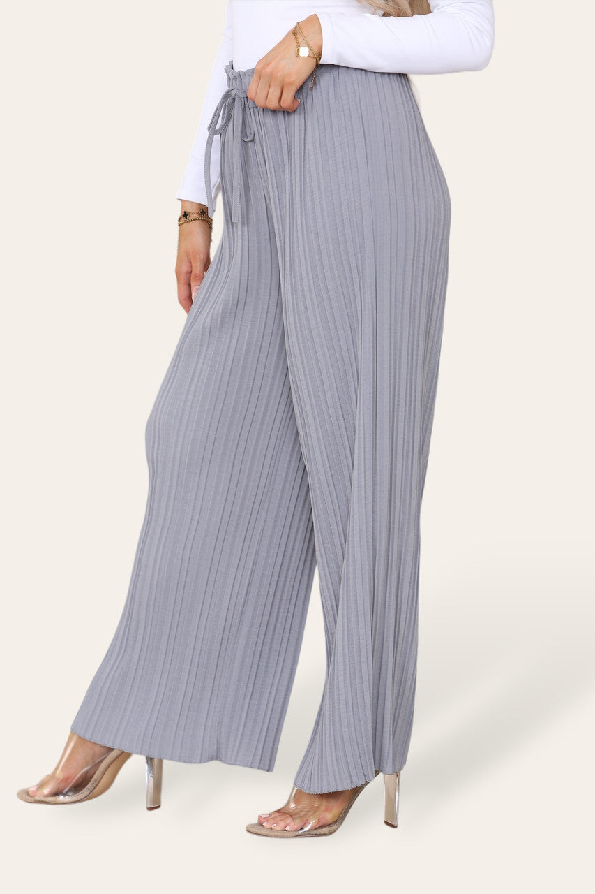 PAPIEREN BROEK MET WIJDE PIJPEN, PLISSÉPLOOIEN EN ELASTIEKE TAILLE ZILVERGRIJS
