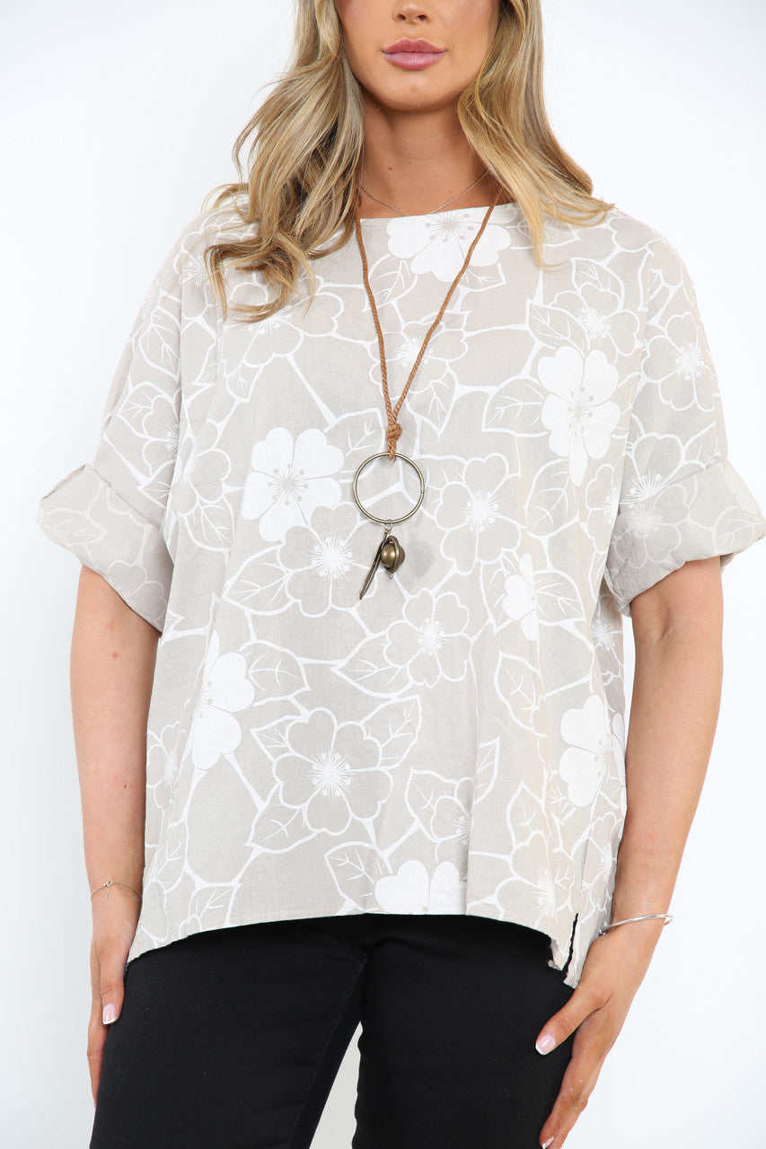 Dames top met bloemenomtrekprint in steenkleur