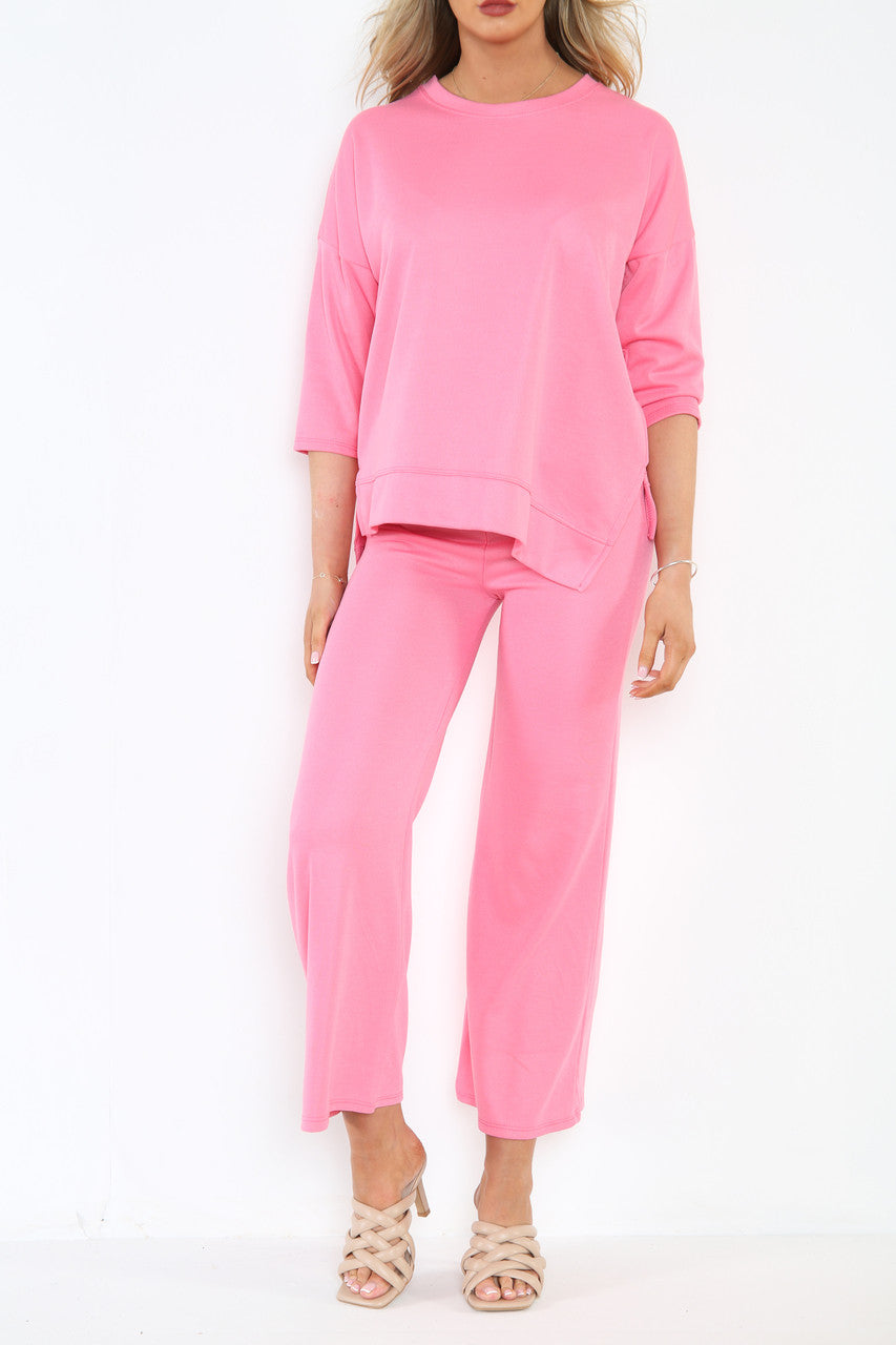 Dames sweatshirt top en broek met wijde pijpen co-ord set roze