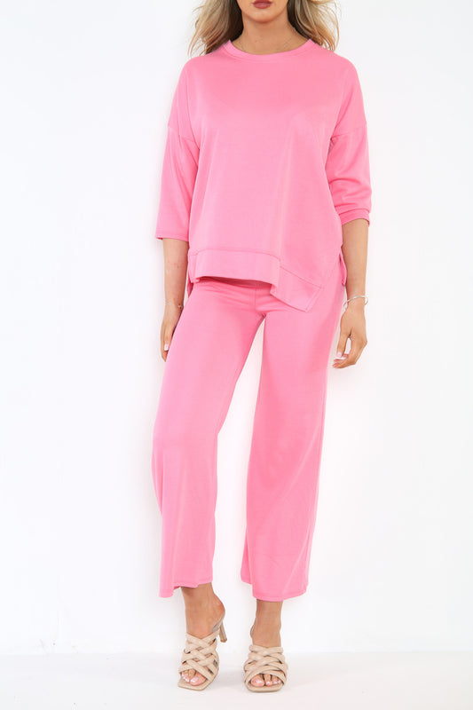Dames sweatshirt top en broek met wijde pijpen co-ord set roze