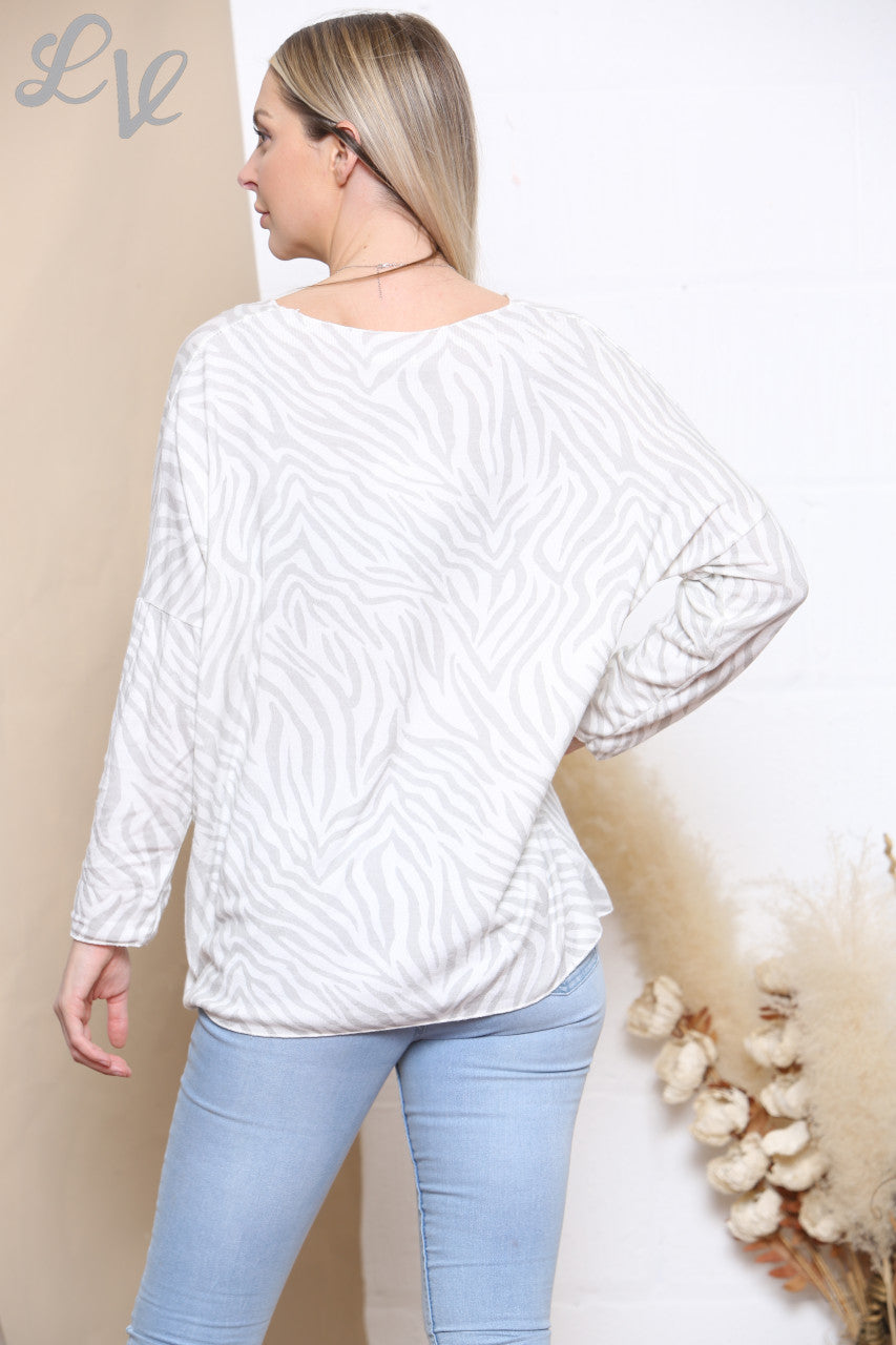 Dames fijngebreide trui met zebraprint wit