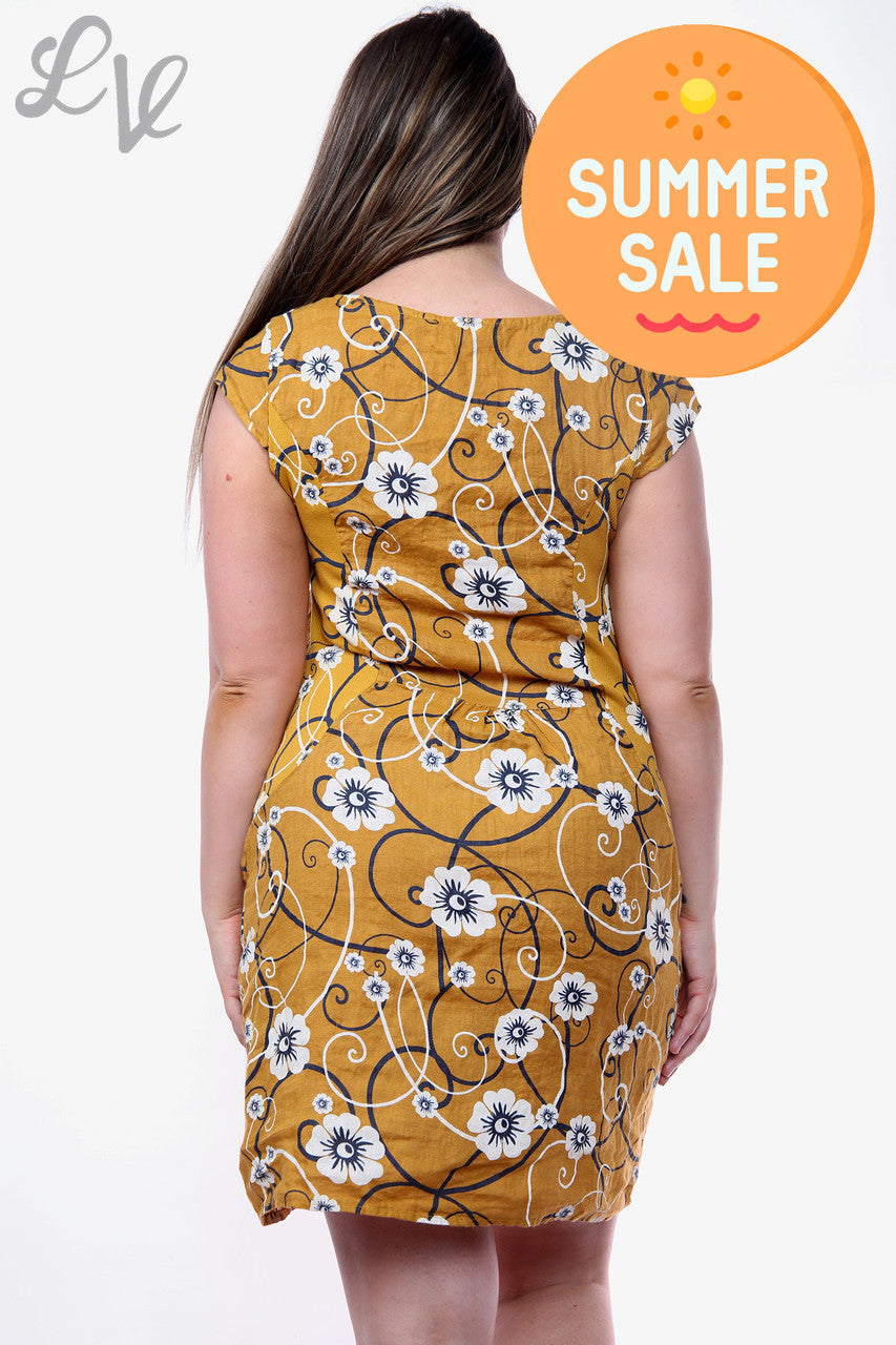 Damesjurk met bloemen- en krulprint Mosterdstukprijs WAS € 14,99 NU € 8,99
